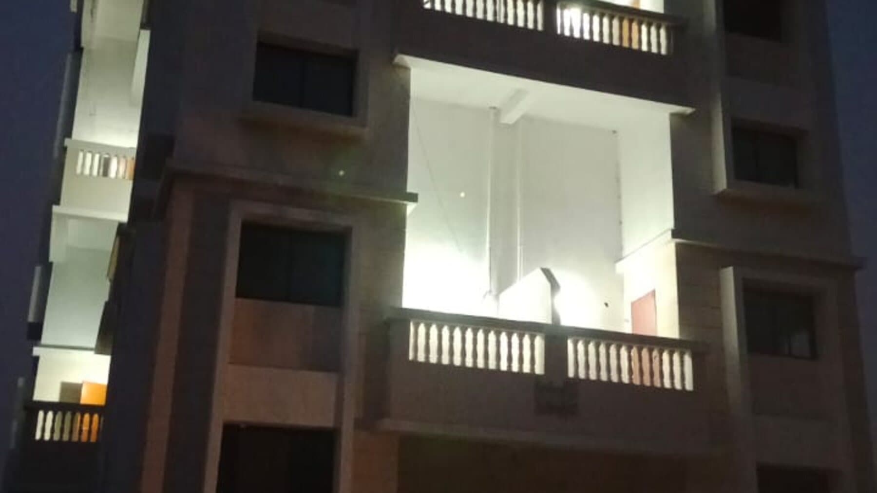 Habitat at dusk — the building lit up, Undri